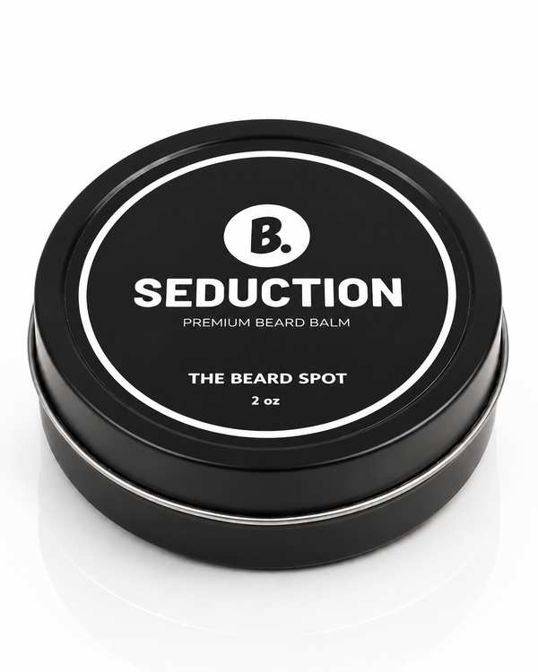 The Beard Spot Seduction Premium Beard Balm, 2 oz closed black metal tin on a clean studio background.